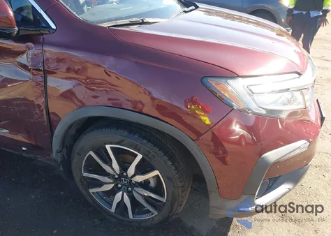 2022 Honda Pilot Awd Touring 7 Passenger z USA, uszkodzony, nr VIN 5FNYF6H61NB000112